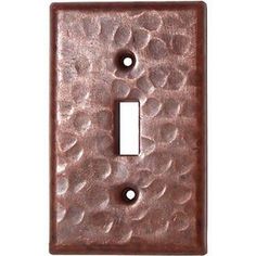 a single light switch cover with an intricate design