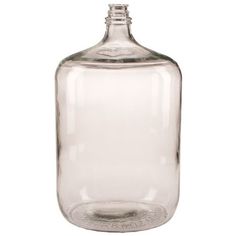 an empty glass bottle is shown on a white background