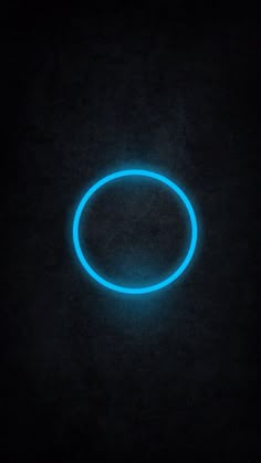 a glowing blue circle in the dark