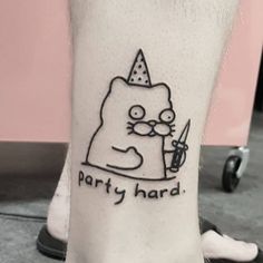 a person with a cartoon tattoo on their leg