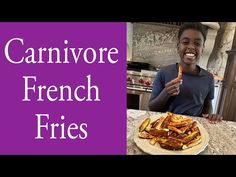 a person sitting at a table with french fries in front of them and the words carnivore french fries