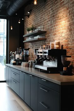 a brick wall in a coffee shop with lots of counter space