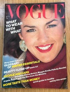 a magazine cover with a woman smiling for the camera