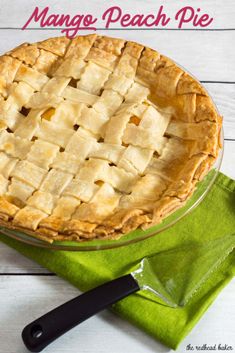 a pie sitting on top of a green cloth