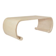 the curved wooden shelf is made out of plywood and has a white finish on it