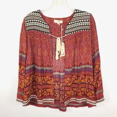 Entro Open Tie Front Boho Red Long Sleeve Blouse Top Sz S New New Size: S Color: Red 100% Rayon Hand Wash Chest (Underarm To Underarm): 21" Waist (Flat Across): 21" Length (Side Of Neck Seam To Hem): 24.5" Sleeve Length (From Shoulder Seam Out): 23" Red Bohemian Top With Floral Print, Red Bohemian Tops With Floral Print, Bohemian Red Tops With Floral Print, Summer Red Boho Print Top, Bohemian Red Floral Print Top, Rayon Tops For Fall Festival, Rayon Blouse For Fall Festival, Red Boho Print V-neck Top, Red Boho Print Tops For Vacation