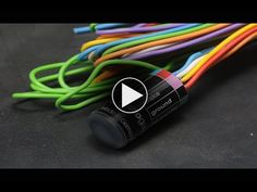 the video shows how to make an electrical wire cable with colored wires and connectors