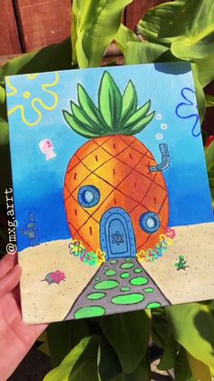 a painting of a pineapple house in the sand