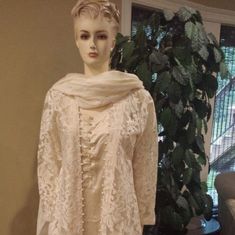 Beautiful Ivory Color Four Piece Lace Fabric Open Style Shirt With Silk Lining And Silk Straight /Cigarette Pant And Dupatta/Shawl. See Size Measurements On The Pic. Fitted Cream Kurta With Sheer Dupatta, Fitted Cream Salwar Kameez With Sheer Dupatta, Fitted Cream Lace Sets, Cream Lace Fitted Sets, Elegant Formal Dupatta With Lace Work, Elegant Cream Sets With Lace Work, Elegant Beige Sets With Lace Work, Elegant Wedding Kurta For Spring, Elegant Spring Wedding Kurta