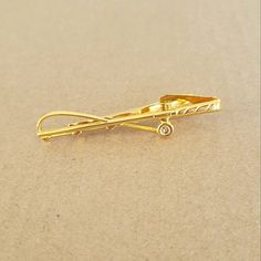 Good Day! Vintage Gold Tone Fishing Pole Tie Clip/Bar/Pin. Unsigned But A Quality Piece. Never Worn & In Excellent Vintage Very Nice Vintage Condition In My Own Opinion. Please Review All Of The Pictures Provided As Part Of The Description & To Form Your Own Opinion Of This Piece. Smoke/Pet Free Environment. Thanks For Viewing & Please Feel Free To Ask Any Questions That You May Have. Have A Beautifully Blessed Day & Take Care! Men's Dress Shirts, Groom, Best Man, Fishing, Gifts For Dad, Ties, V Tie Clips For Men, Gold Tie Clip, Fishing Gifts For Dad, Man Fishing, Vintage Ties, Men's Dress Shirts, Gold Tie, Vintage Tie, Tie Pin