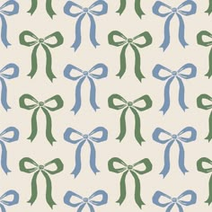 a blue and green bow pattern on a white background