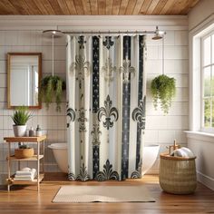 a bath room with a shower curtain and a rug