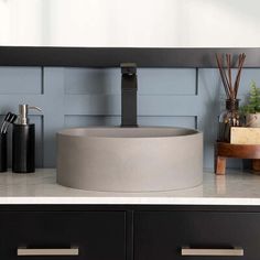 a bathroom sink sitting on top of a counter