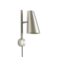 a wall light with a white shade on it