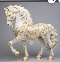 a white and gold figurine of a horse on a gray background with the caption's name below it