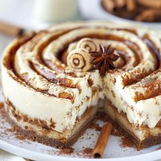 a cinnamon roll cake on a white plate