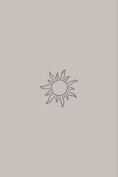 a black and white drawing of a sun on a gray background