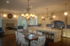 a dining room table and chairs in a kitchen