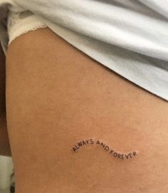 a woman's thigh with the words always and forever written on it