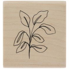 a rubber stamp with a plant drawn on it