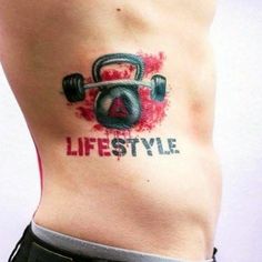 a man with a tattoo on his stomach that says lifestyle and an image of a dumbble weight