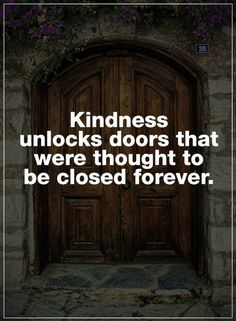 a wooden door with the words kindness unlocks doors that were thought to be closed forever