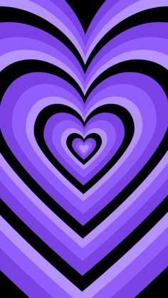 a purple heart shaped object with black and white lines in the center on a black background