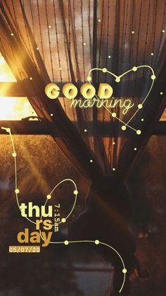 there is a window with the words good morning on it