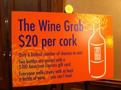 a sign that is on the side of a door saying wine grab $ 20 per cork