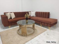 a living room with a couch, coffee table and rug