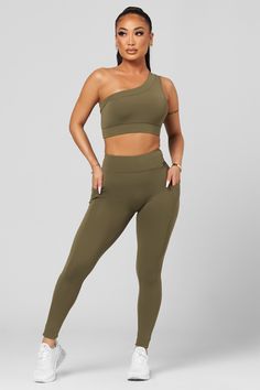 The silhouette that everyone loves, just elevated. With a wide band for extra support and a sleek design for a more classy look, our new Classic One Shoulder is the perfect edition to your favorite legging. The details: Supportive, covered elastic band Removable Pads Quick-dry fabric 75% nylon / 25% spandex Gym Fits, Hidden Pocket, New Classic, How To Look Classy, Wide Bands, Printed Leggings, Pet Hair, Elastic Band, Sleek Design