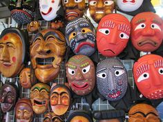 many different masks are on display for sale