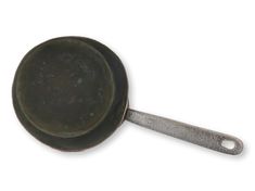 an old cast iron skillet on a white background