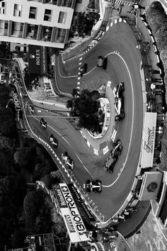 black and white photograph of an aerial view of a race track