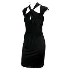 Luxury Fitted Gucci Mini Dress, Gucci Fitted Mini Dress For Night Out, Gucci Summer Dress For Night Out, Gucci Knee-length Cocktail Dress, Luxury Sleeveless Silk Mini Dress, Luxury Silk Sleeveless Mini Dress, Elegant Sleeveless Gucci Mini Dress, Black Silk Gucci Dress, Gucci Formal Summer Dresses