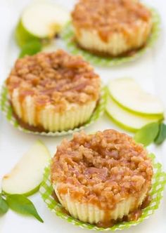 three cupcakes with apples and cinnamon on top