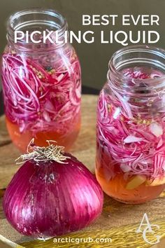 two jars filled with red onions and pickling liquid