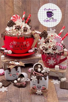 an assortment of christmas decorations on a wooden table with candy canes and marshmallows