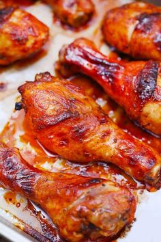 some chicken wings sitting on top of a pan