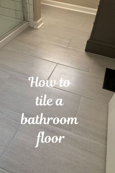 a bathroom floor with the words how to tile a bathroom floor in white lettering on it