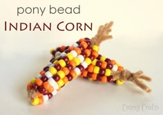 Pony Bead Indian Corn - Fun and easy Thanksgiving craft for the kids! by Guest Blogger Jessica from Cutesy Crafts Pony Bead Pumpkins, Pony Bead Pumpkin Craft, Thanksgiving Pony Bead Craft, Pony Bead Indian Corn Craft, Indian Corn Beads And Pipe Cleaners, Fun Craft, Easy Thanksgiving Crafts, Pony Bead Crafts, Indian Corn