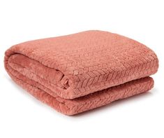 two blankets folded on top of each other in different colors and patterns, one is pink