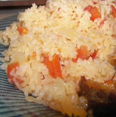 rice with meat and vegetables on a plate