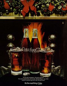 an advertisement for coca cola with three glasses of coke in front of a fire place