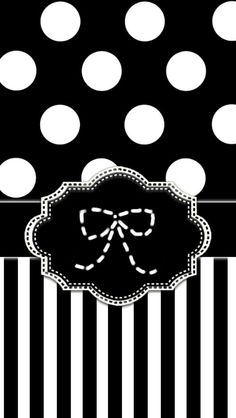 a black and white polka dot background with a bow on the front, and stripes in the back