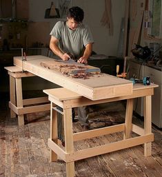 a man working on woodworking in his workshop