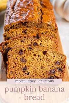 a loaf of pumpkin banana bread on a cutting board with the words moist cozy delicious