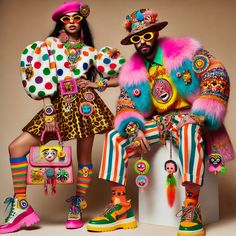 two women in colorful clothing and accessories posing for the camera