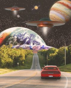 a red car driving down a road surrounded by planets