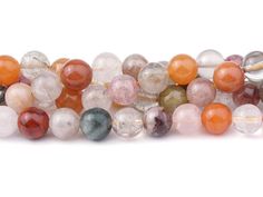 multicolored agate beads on white background